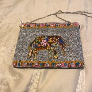 Excellent never used condition. Over the shoulder sequined hand bag.